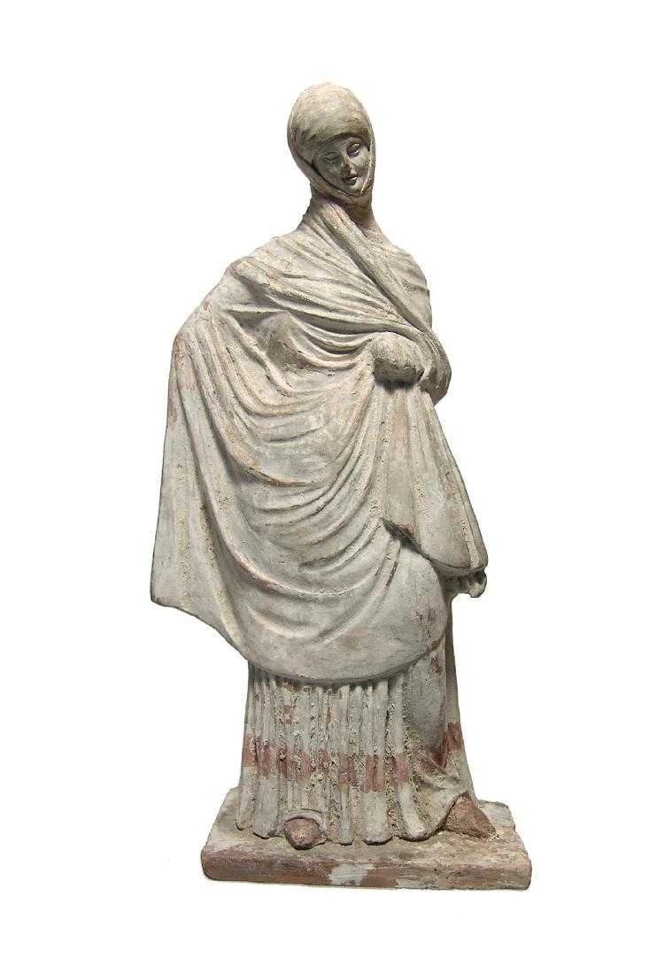 Greek Tanagra Figurine of a Woman. Photo: Ancient Resource