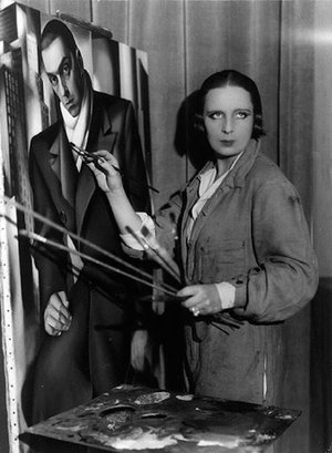 Tamara de Lempicka painting a portrait of her husband, Tadeusz Lempicki, circa 1928, image via Culturepl