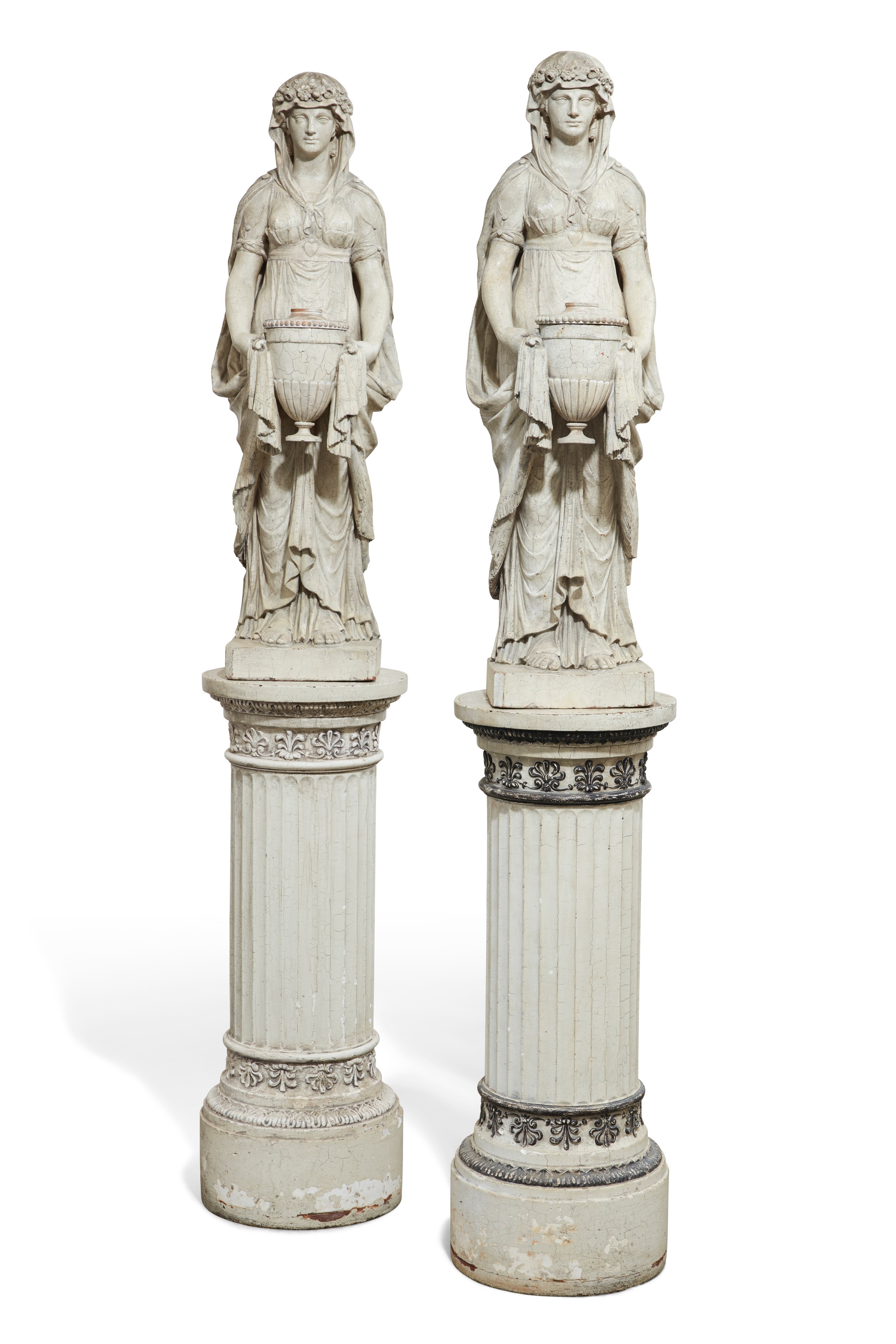 Pair of English Regency 19th century white painted terra cotta figures of vestal virgins, on later pedestals (est. $3,000-5,000).