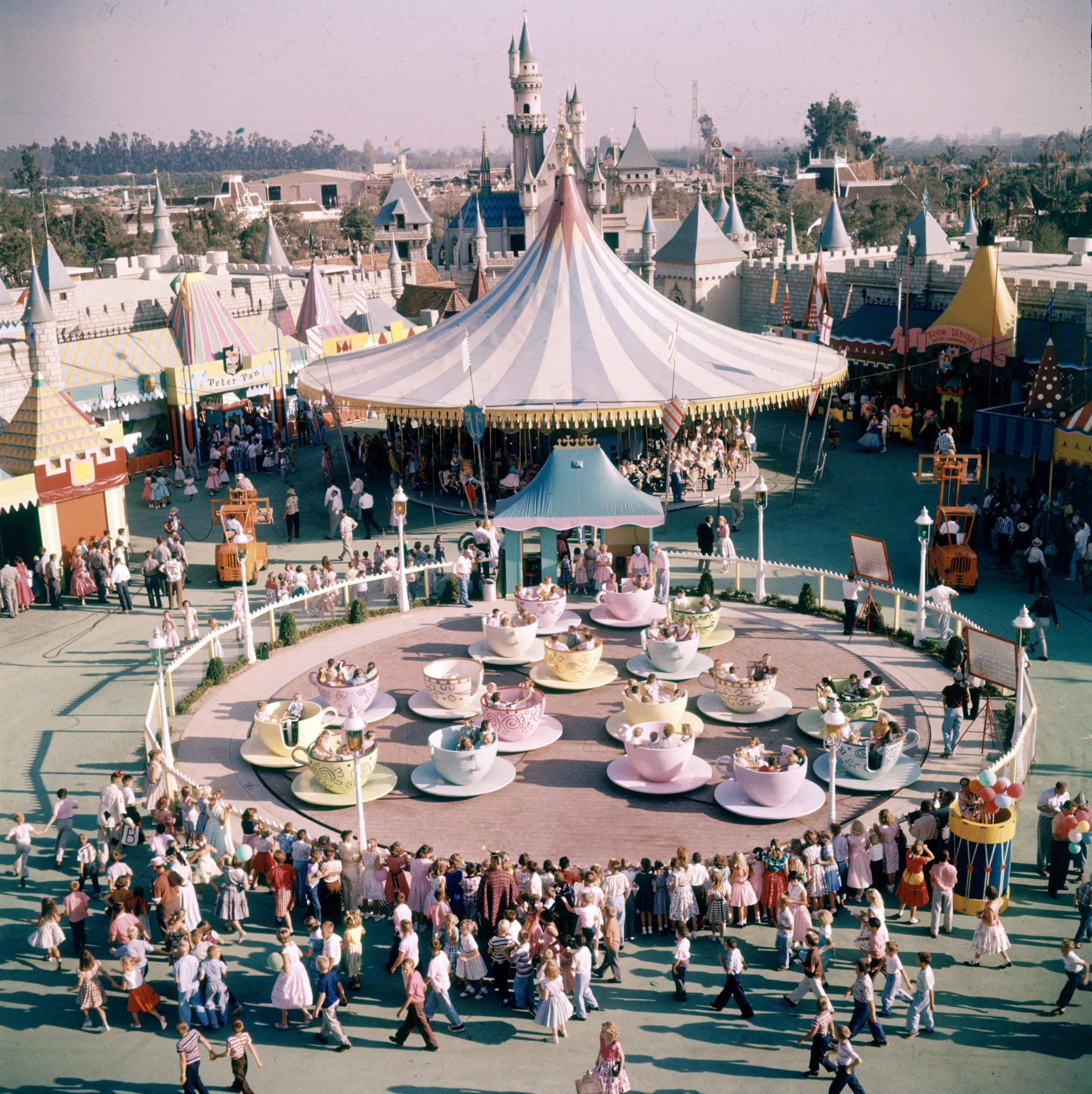 People riding the teacup ride at Disneyland Amusement Park.