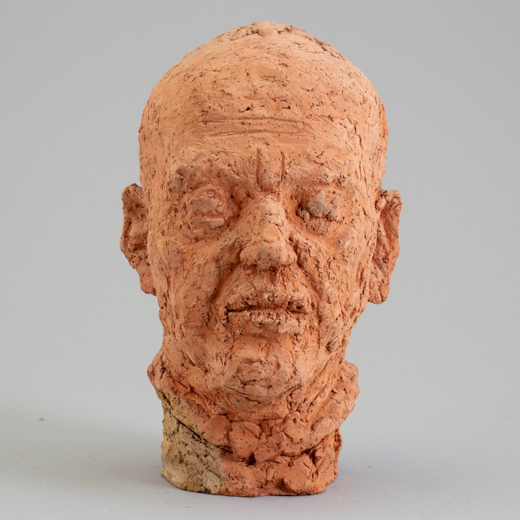 Amund Arle, "Manshuvud", skulptur i terracotta. Foto: Bukowskis.