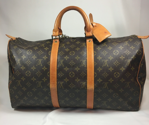 Louis Vuitton Keepall 50 Travelbag in monogram canvas. Still In Fashion