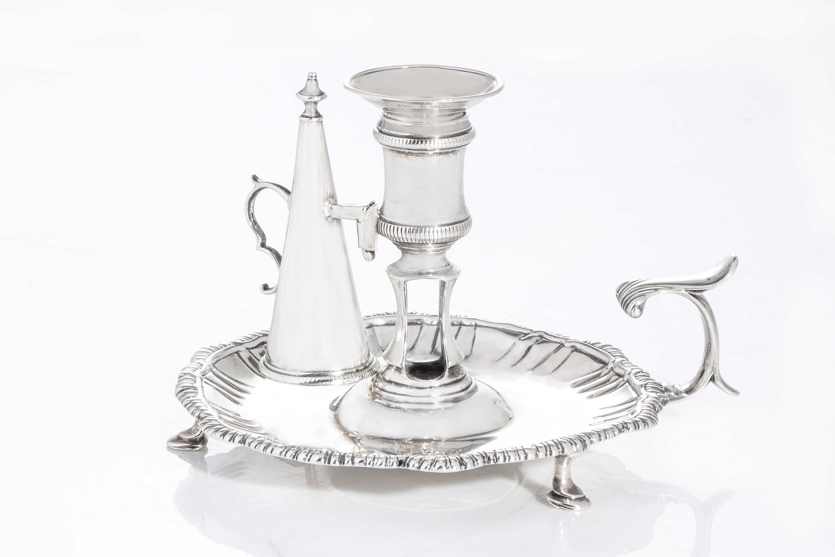 George III sterling silver chamberstick by William Cafe (London, 1762) (est. $300-$500).