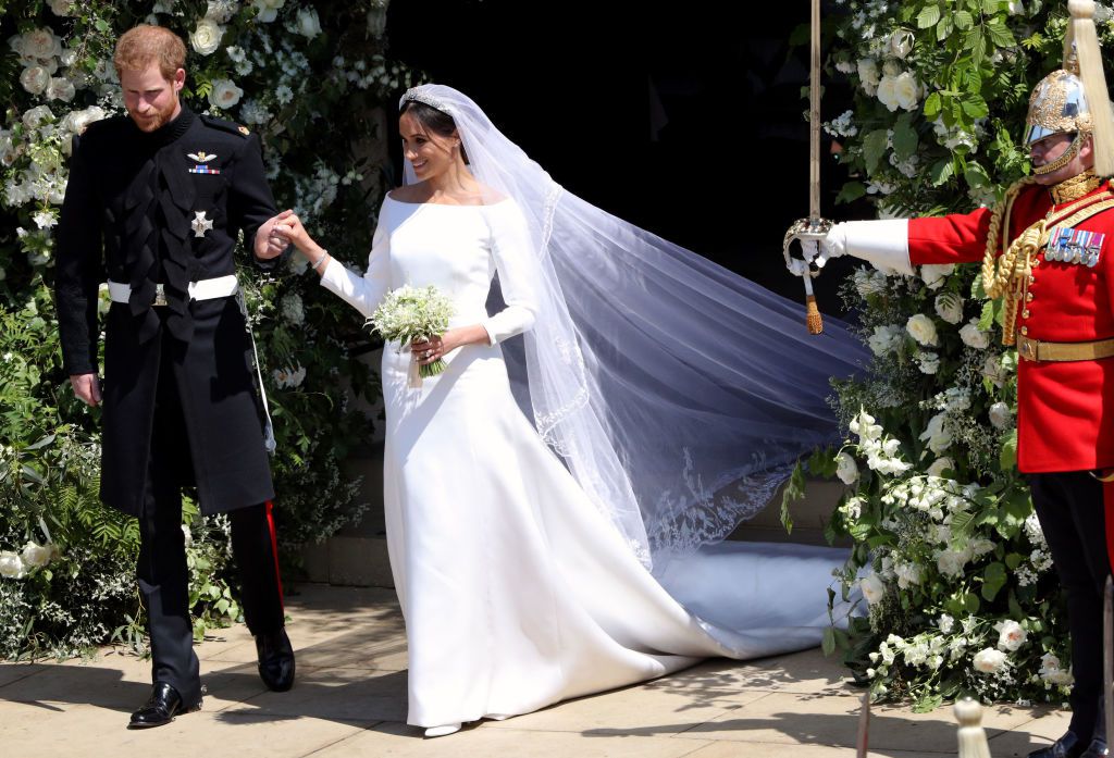 Meghan Markle wearing a Givenchy dress designed by Clare Waight Keller at the royla wedding to Prince Harry, May 2018. Image via Town & Country