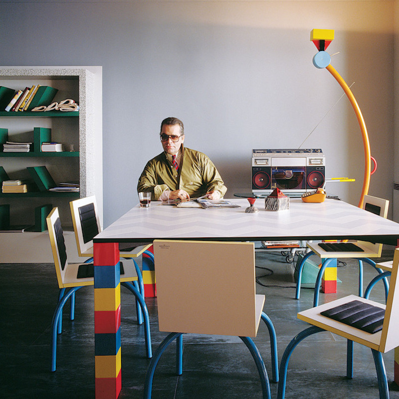 Karl Lagerfeld surrounded by Memphis furniture. Photo via The Cut