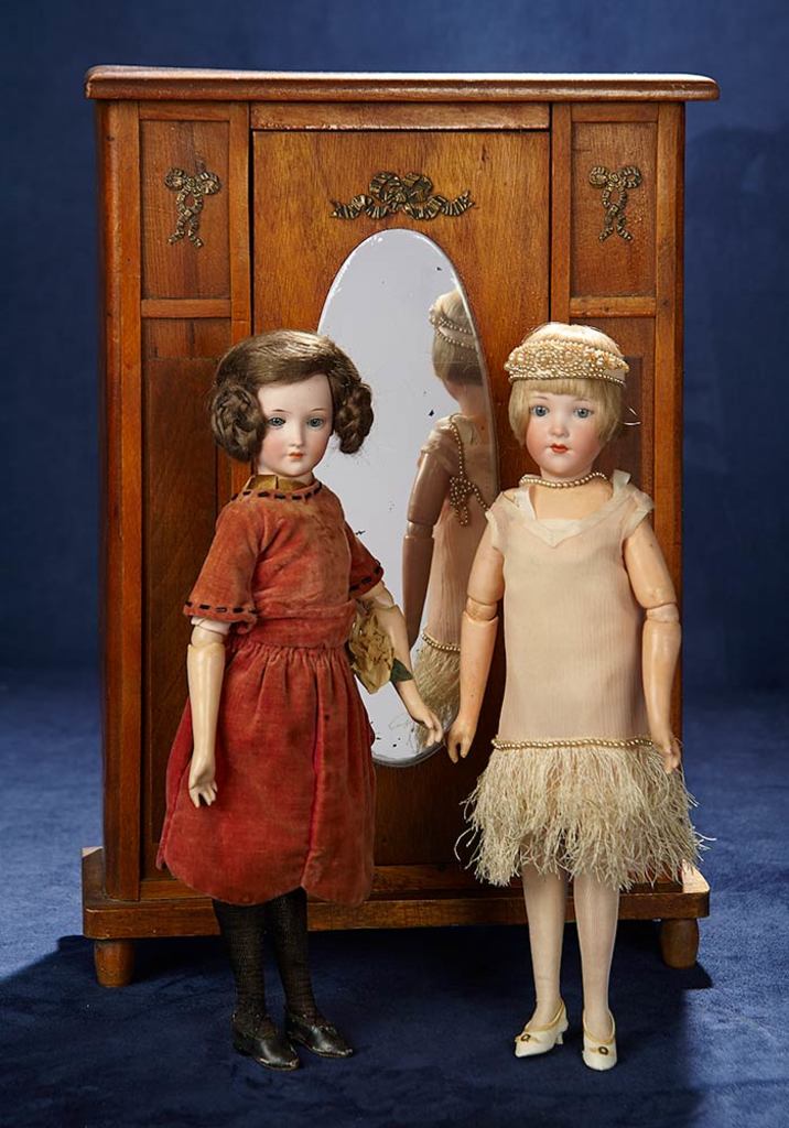 Muñecas de porcelana alemanas. Imagen vía: Barnebys