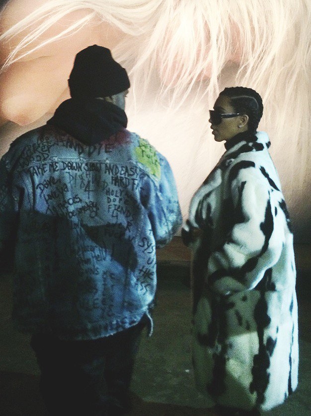 Kanye wearing the jacket in question with wife Kim Kardashian Image via Hypebeast