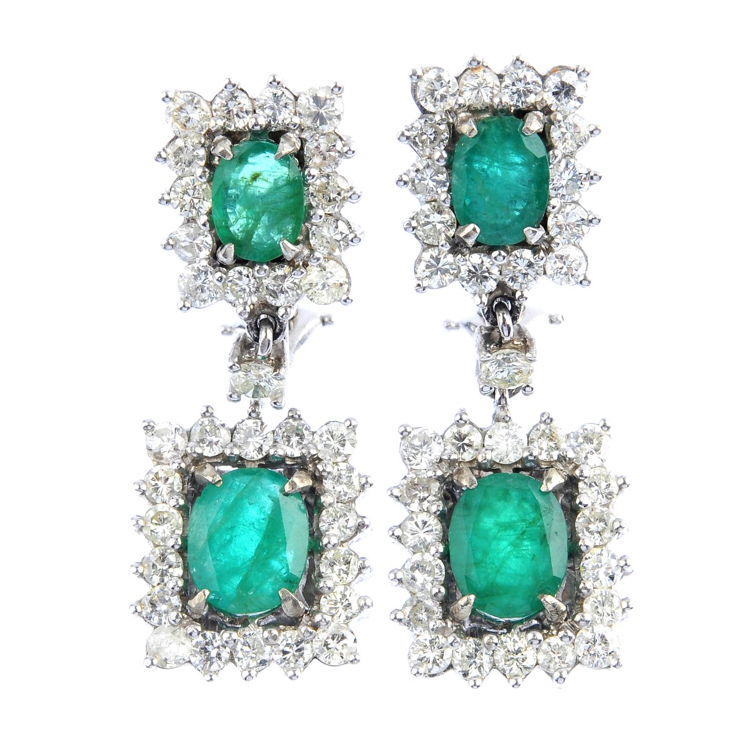 A pair of emerald and diamond earrings