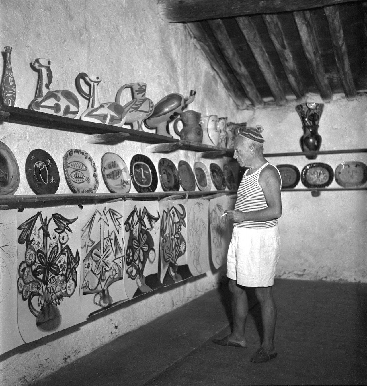 Picasso with his ceramics.