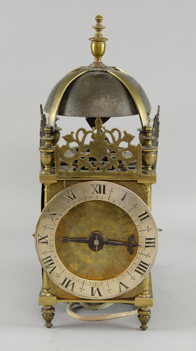 A rare mid-17th century English brass lantern clock, saw a battle of three phone bidders, going against multiple bidders online and in the room. It had a final price of £16,510
