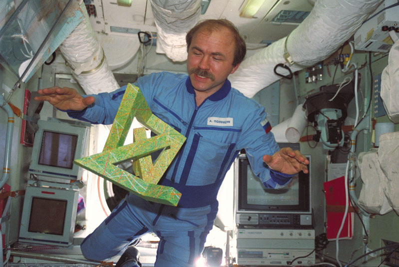 Cosmonaut Alexander Polischuk in zero gravity with "Cosmic Dancer", image via Cosmicdancer.com