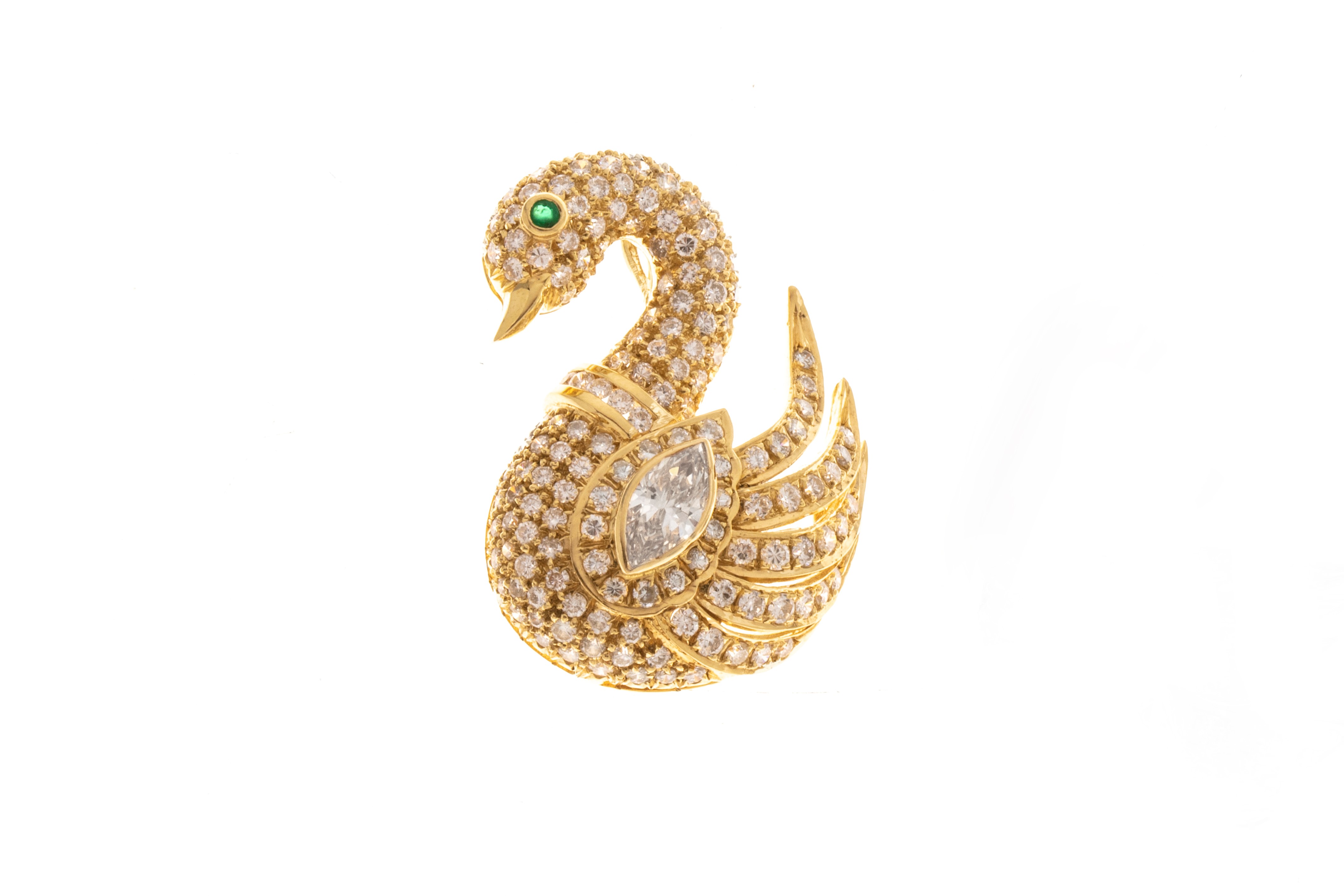 Diamond and 18K white gold swan form pendant-brooch (est. $700-$900).