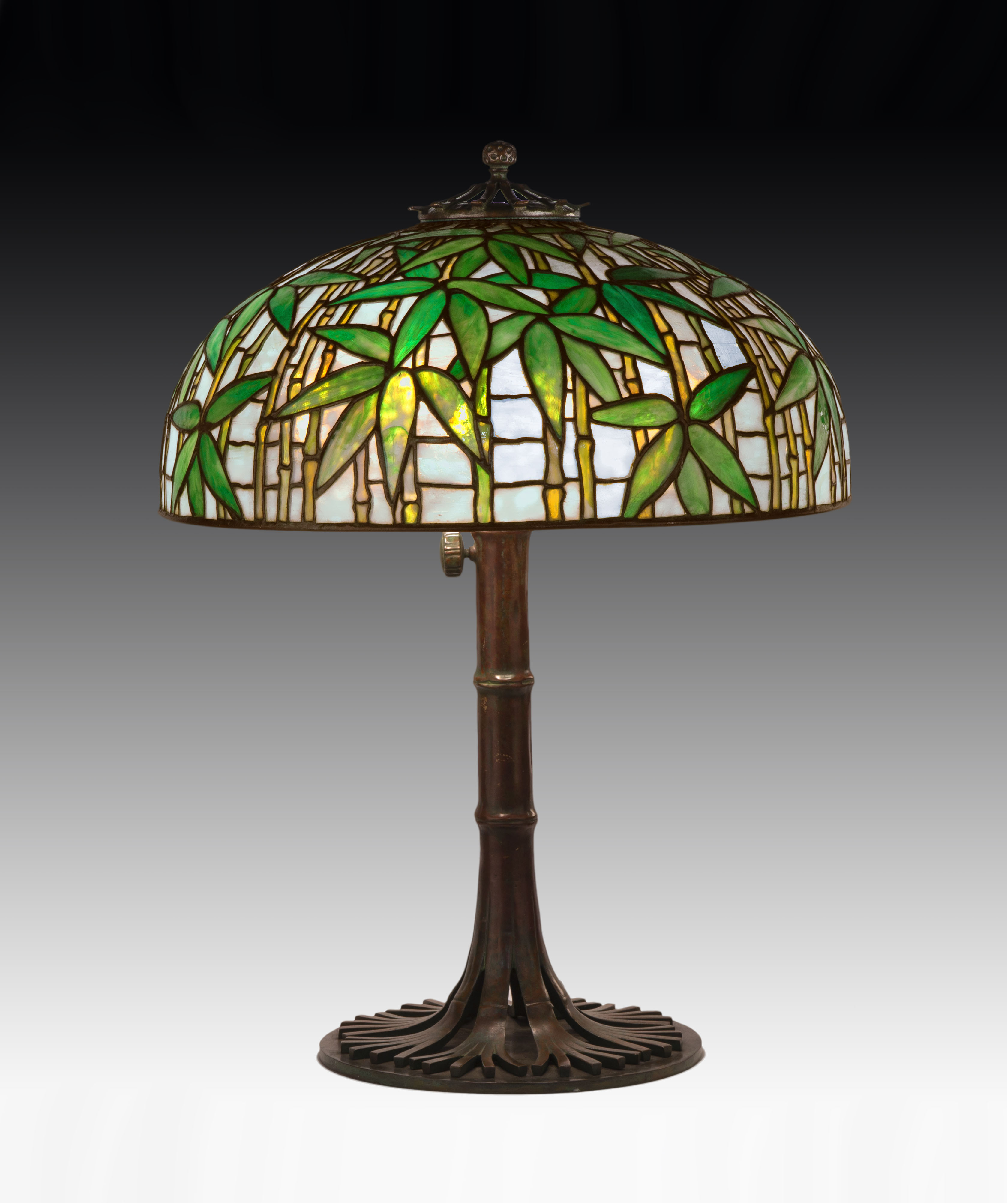 Several beautiful Tiffany Studios (N.Y.) lamps illuminated the room before finding new buyers. They included this gorgeous Bamboo table lamp ($85,500).