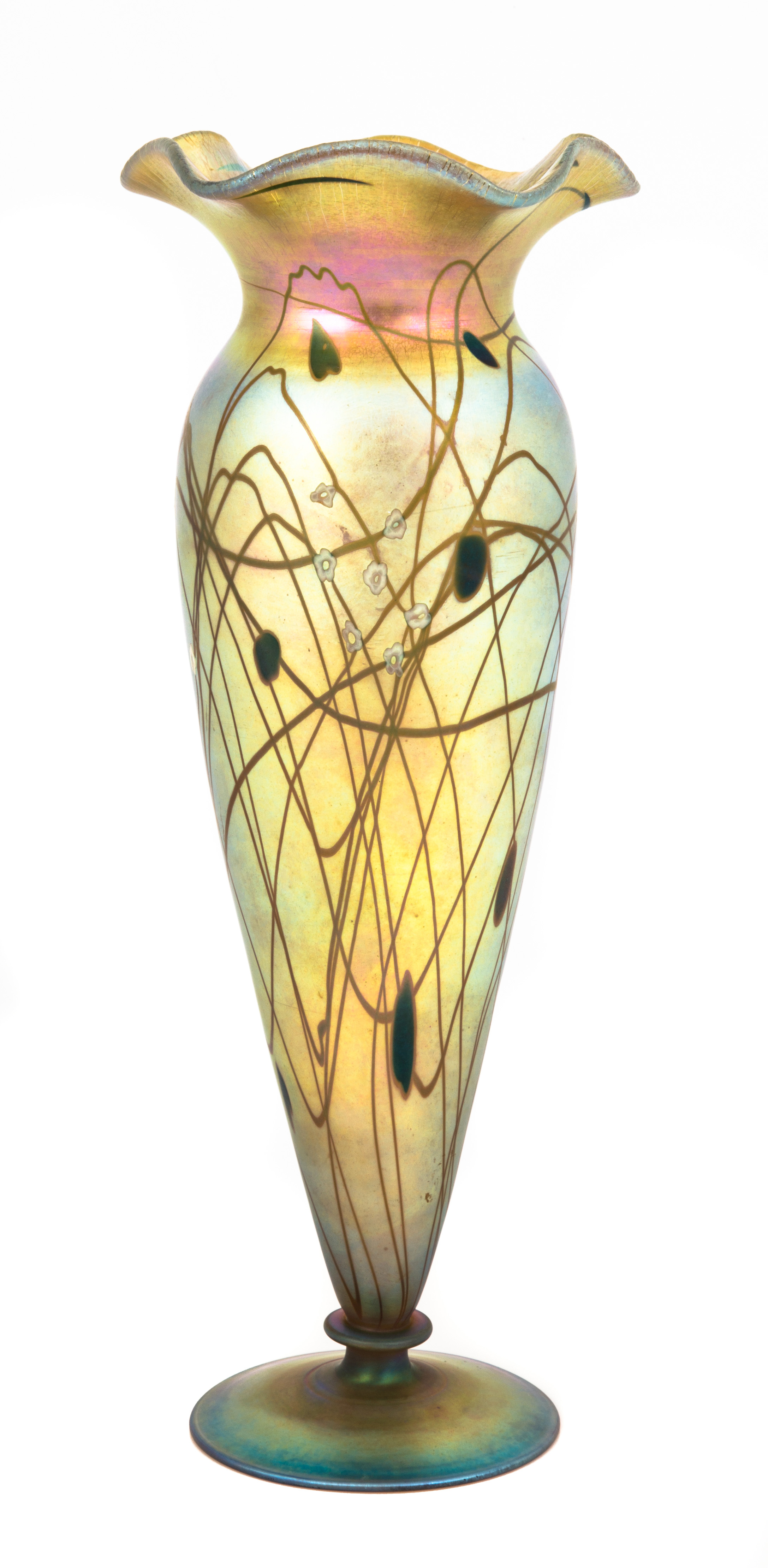 Rare Steuben Aurene & Millefiori decorated vase, 14 inches tall, decorated with leaf and vines and a ruffled top and signed “Aurene Haviland” ($6,500).