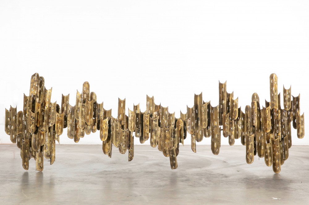 Tom Greene beaten and patinated metal light sculpture, circa 1960s ($600-$800).