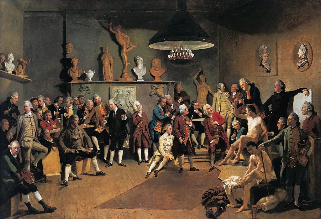 Johann Zoffany, Die Portraits der Gründungsmitglieder der Royal Academy, 1771–72. Um das weibliche Zartgefühl der beiden Gründungsmitglieder Angelika Kauffmann und Mary Moser zu schützen, nahmen sie an der abgebildeten Aktmalstunde nur als Portraits an der Wand teil...
