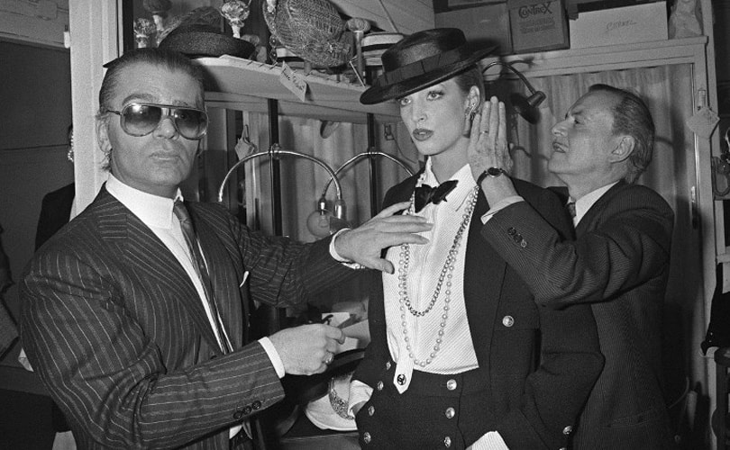 Lagerfeld prepping a model for the Chanel runway