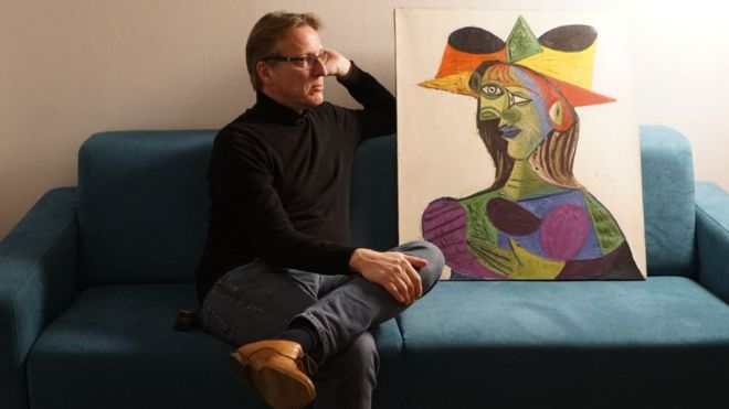 Arthur Brand with the stolen Picasso. Image: BBC