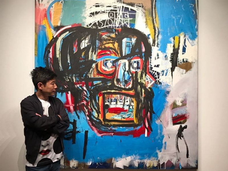 Yusaku Maezawa devant le tableau « Untitled » par Jean-Michel Basquiat, qui a rejoint sa collection le 5 mai 2017