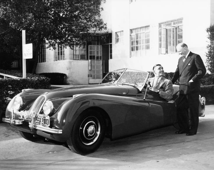 Sir William Lyons personally delivering an XK120 to Clark Gable